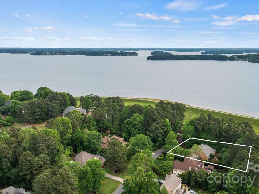 8032 Turnberry Lane, Stanley, NC 28164.  MLS# CAR4250086, YatesRealty ID 11180. Enjoy walks along the shore of Lake Norman!