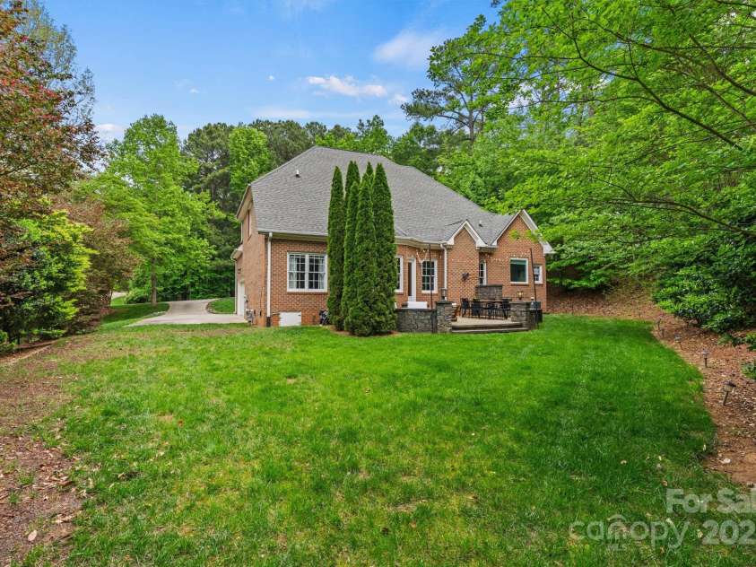 8032 Turnberry Lane, Stanley, NC 28164.  MLS# CAR4250086, YatesRealty ID 11180. Flat, private rear yard