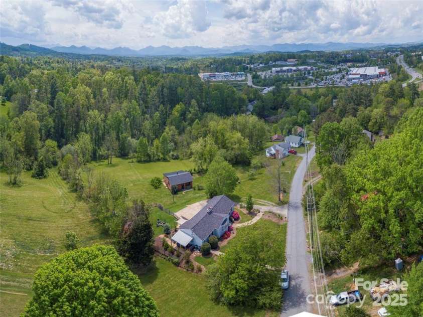 64 Alexander Road, Weaverville, NC 28787.  MLS# CAR4252153, YatesRealty ID 11181. Aerial view of property