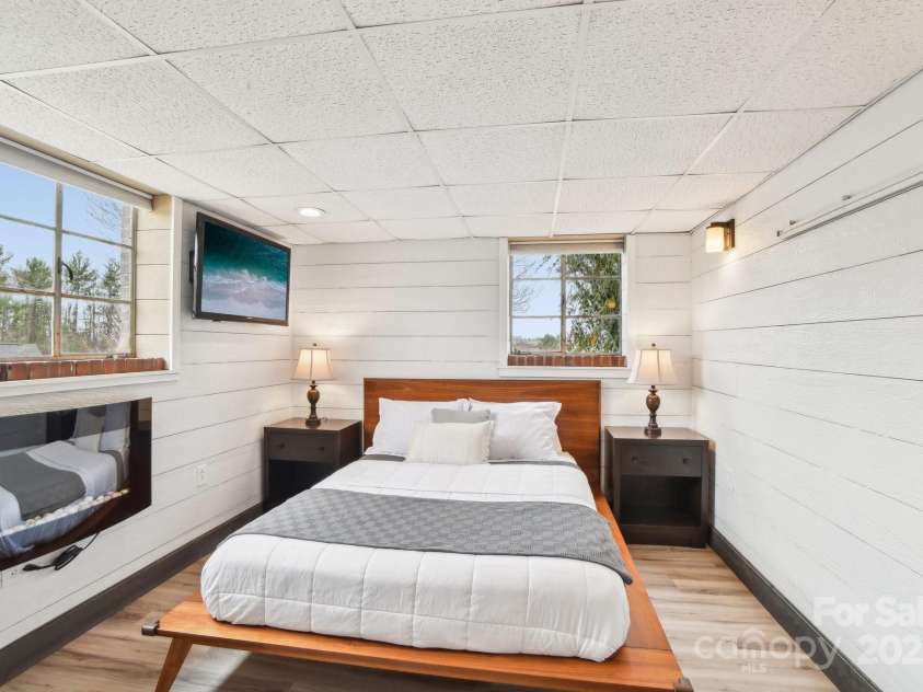 64 Alexander Road, Weaverville, NC 28787.  MLS# CAR4252153, YatesRealty ID 11181. Bonus room in basement with electric fireplace