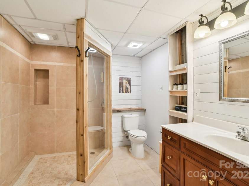 64 Alexander Road, Weaverville, NC 28787.  MLS# CAR4252153, YatesRealty ID 11181. Full bathroom in basement