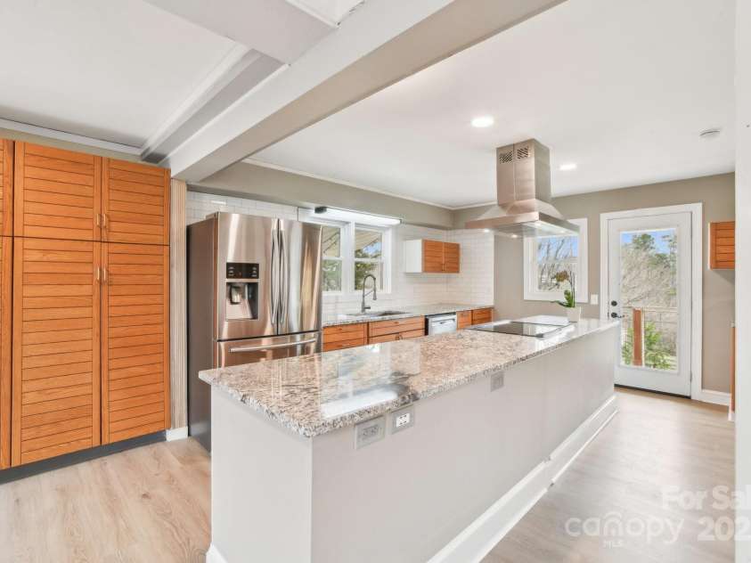 64 Alexander Road, Weaverville, NC 28787.  MLS# CAR4252153, YatesRealty ID 11181. Kitchen with large island