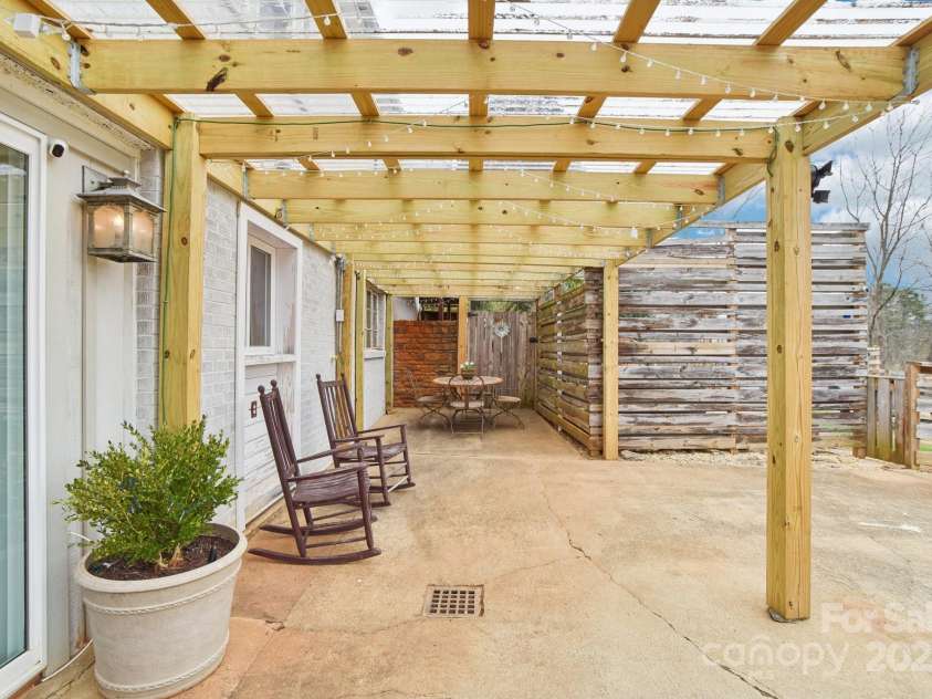 64 Alexander Road, Weaverville, NC 28787.  MLS# CAR4252153, YatesRealty ID 11181. Rear patio