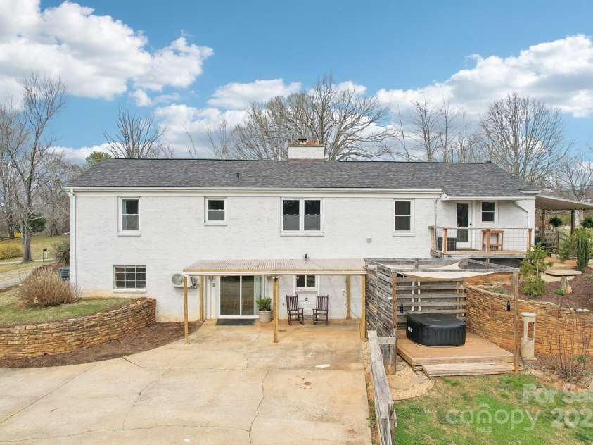 64 Alexander Road, Weaverville, NC 28787.  MLS# CAR4252153, YatesRealty ID 11181. Rear view of house