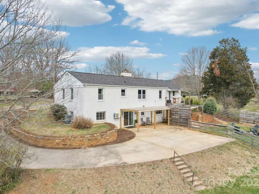 64 Alexander Road, Weaverville, NC 28787.  MLS# CAR4252153, YatesRealty ID 11181. Rear view of house