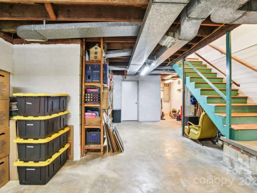 64 Alexander Road, Weaverville, NC 28787.  MLS# CAR4252153, YatesRealty ID 11181. Storage in basement