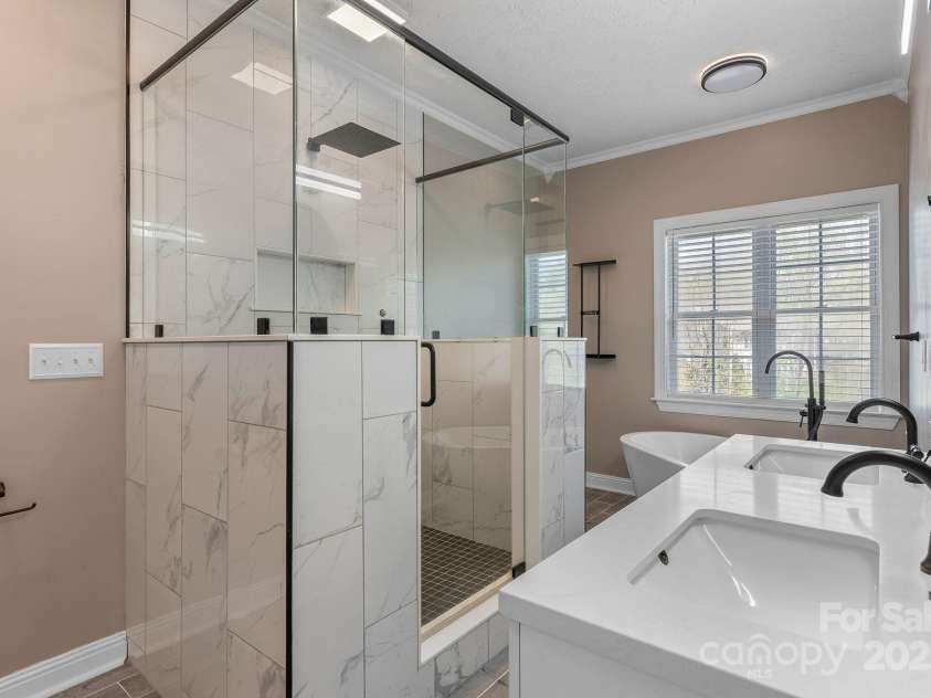 79 Mill Pond Way, Hendersonville, NC 28791.  MLS# CAR4230909, YatesRealty ID 11183. Custom Large Shower is newly finished and ready for you.