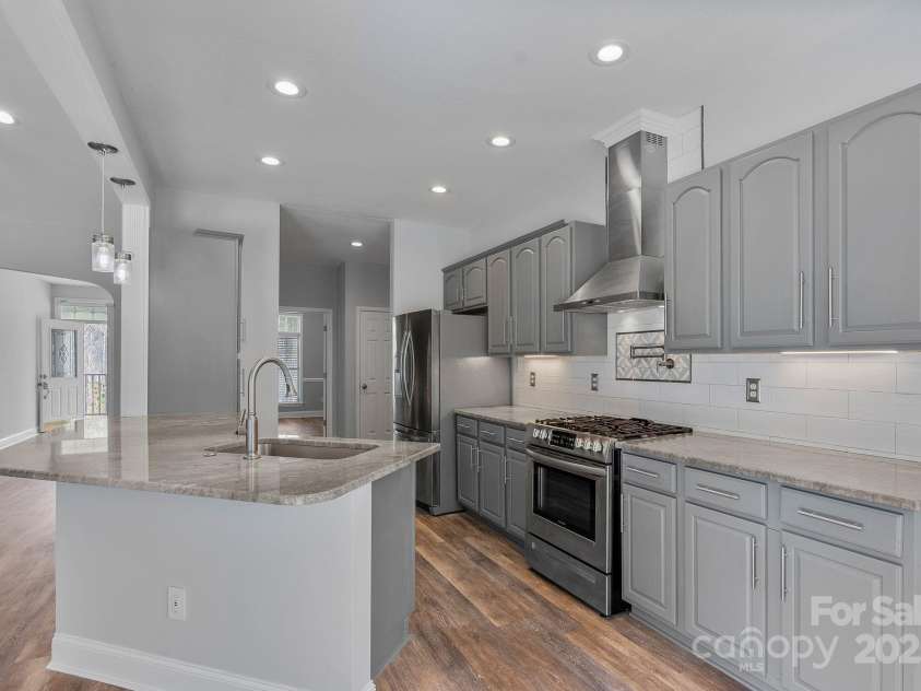 79 Mill Pond Way, Hendersonville, NC 28791.  MLS# CAR4230909, YatesRealty ID 11183. Light filled custom kitchen