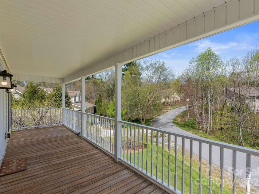 79 Mill Pond Way, Hendersonville, NC 28791.  MLS# CAR4230909, YatesRealty ID 11183. New Decking: enjoy the covered space and relax.