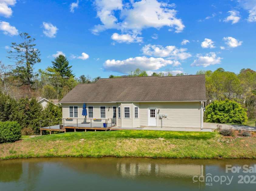 79 Mill Pond Way, Hendersonville, NC 28791.  MLS# CAR4230909, YatesRealty ID 11183. Rear view drive into garage - Drone shot.