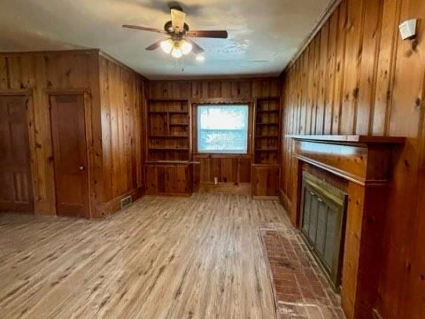 455 Spring Street, Albemarle, NC 28001.  MLS# CAR4331413, YatesRealty ID 11184. Den/living room 
