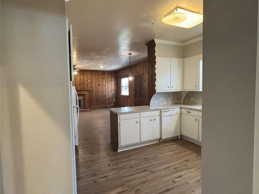 455 Spring Street, Albemarle, NC 28001.  MLS# CAR4331413, YatesRealty ID 11184. Hall from lr looking towards kitchen