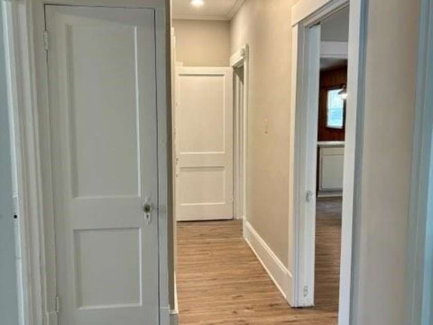 455 Spring Street, Albemarle, NC 28001.  MLS# CAR4331413, YatesRealty ID 11184. Hallway to bedrooms 