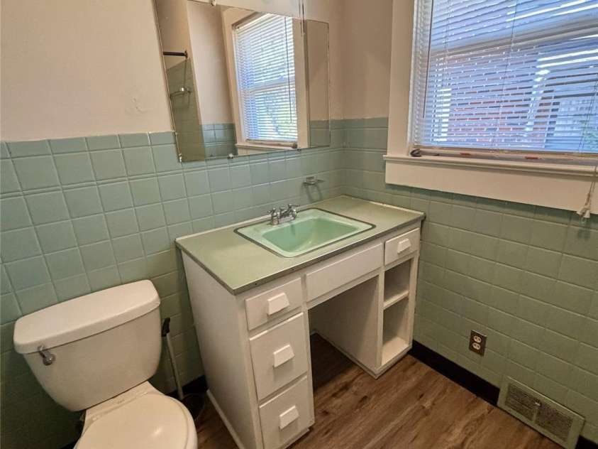 455 Spring Street, Albemarle, NC 28001.  MLS# CAR4331413, YatesRealty ID 11184. Primary full bath 