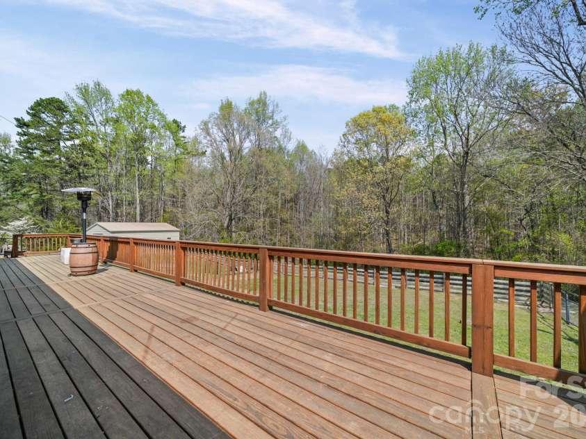 235 Spring Estates Circle, Salisbury, NC 28146.  MLS# CAR4360389, YatesRealty ID 11185. 56'X10' Deck across entire home