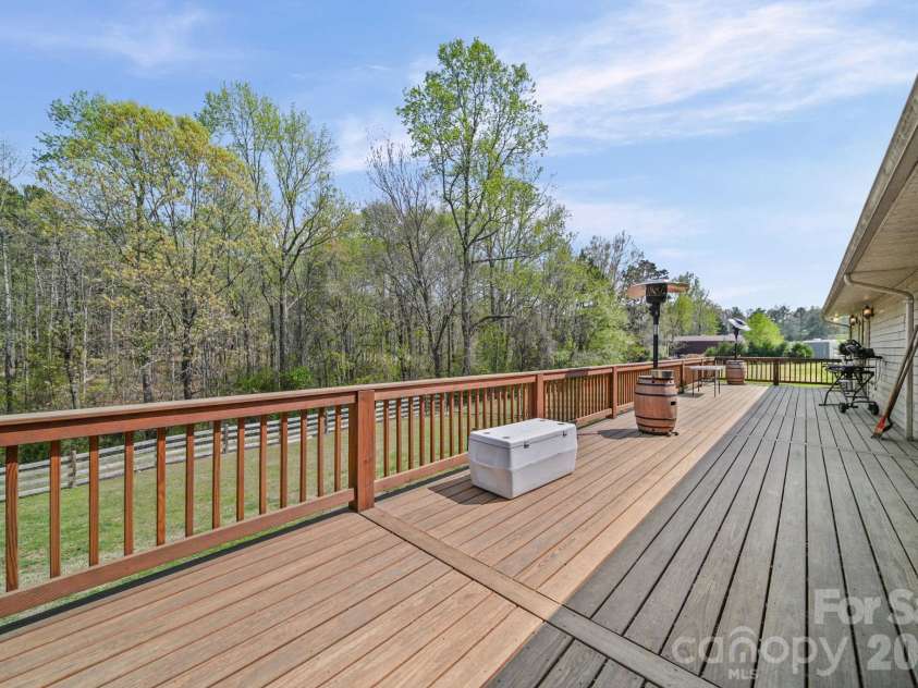 235 Spring Estates Circle, Salisbury, NC 28146.  MLS# CAR4360389, YatesRealty ID 11185. Expansive Deck across back of Home