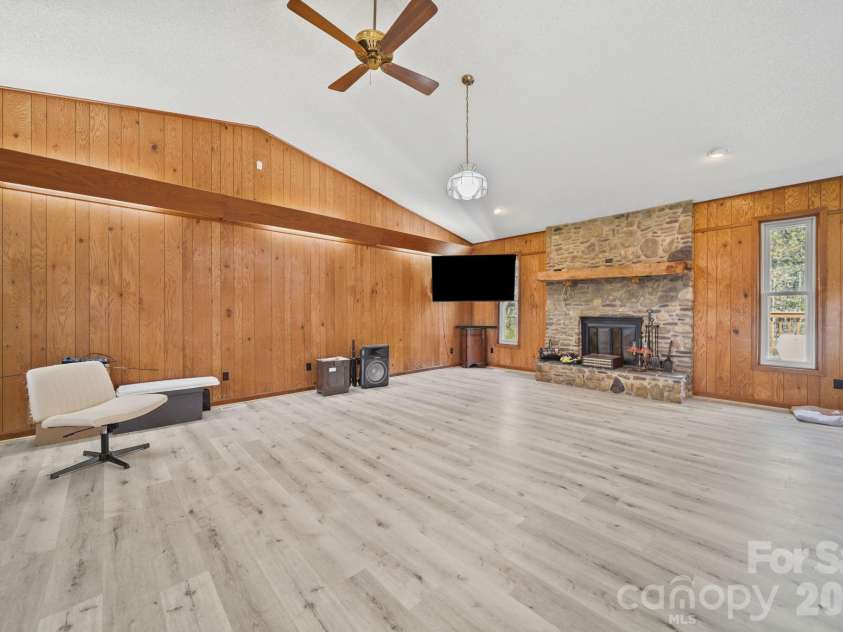 235 Spring Estates Circle, Salisbury, NC 28146.  MLS# CAR4360389, YatesRealty ID 11185. Sunken Great Room with Stone Fireplace