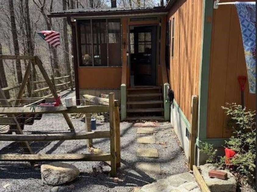 228 Mountain Laurel Road, Maggie Valley, NC 28751.  MLS# CAR4221935, YatesRealty ID 11186. 