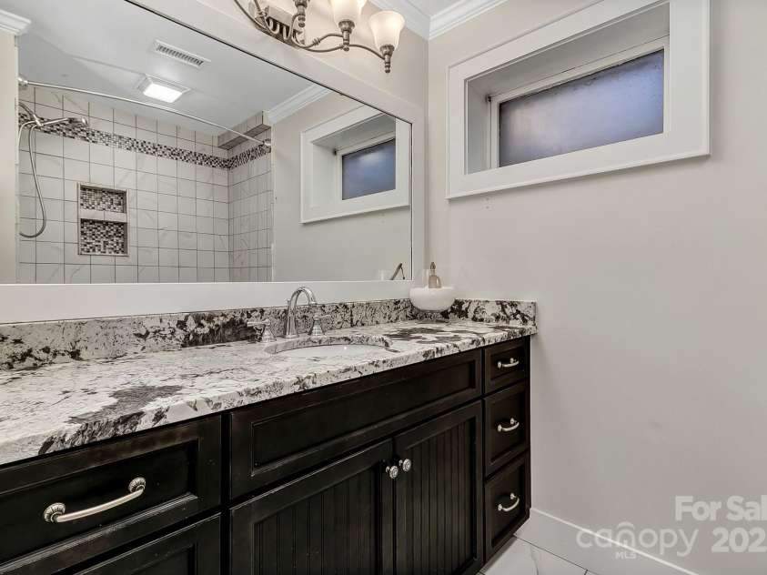 570 Brandon Road, Black Mountain, NC 28711.  MLS# CAR4241895, YatesRealty ID 11191. Lower Level Bath