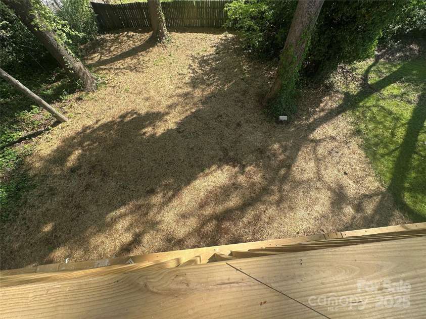 1413 Hateras Avenue, Charlotte, NC 28216.  MLS# CAR4246370, YatesRealty ID 11196. Beautiful Backyard has endless possibilities!