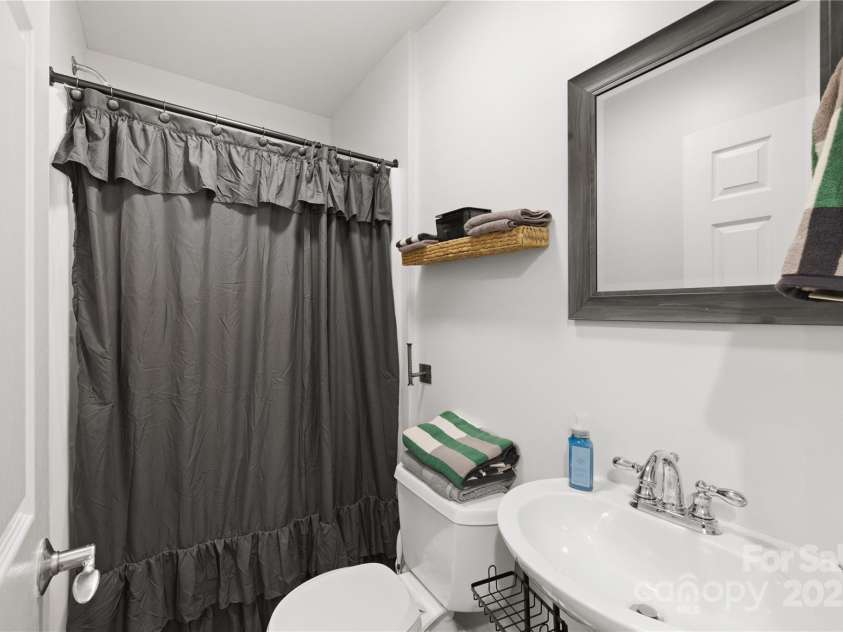 1308 Bell Mountain Road, Zirconia, NC 28790.  MLS# CAR4317514, YatesRealty ID 1120. Lower level full bath 