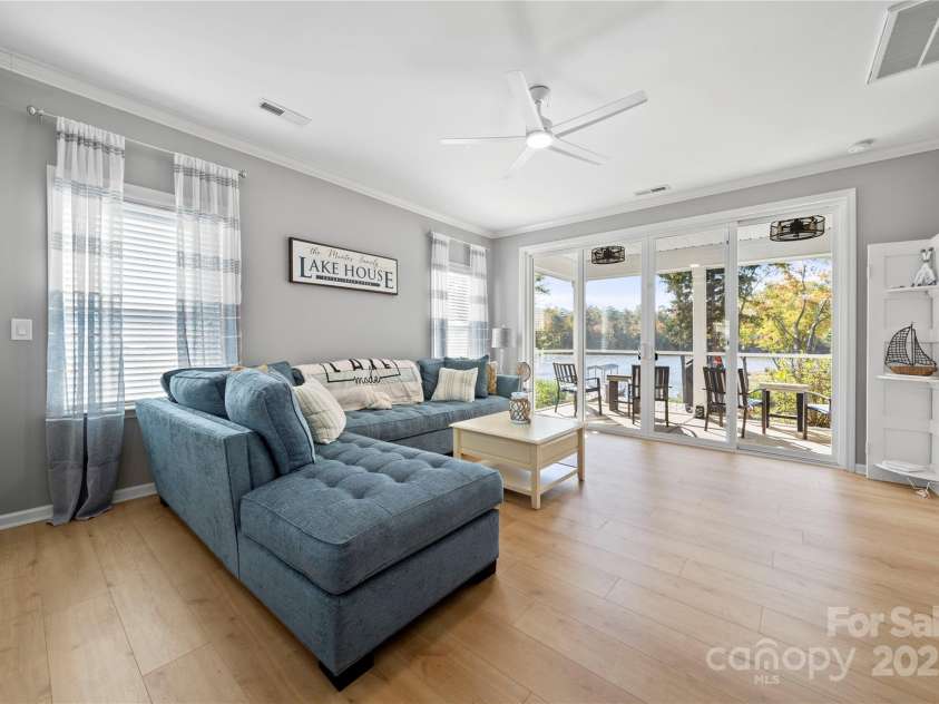 31226 Cove View Court, Lancaster, SC 29720.  MLS# CAR4253518, YatesRealty ID 11204. 8' by 12' sliding door to screened in porch