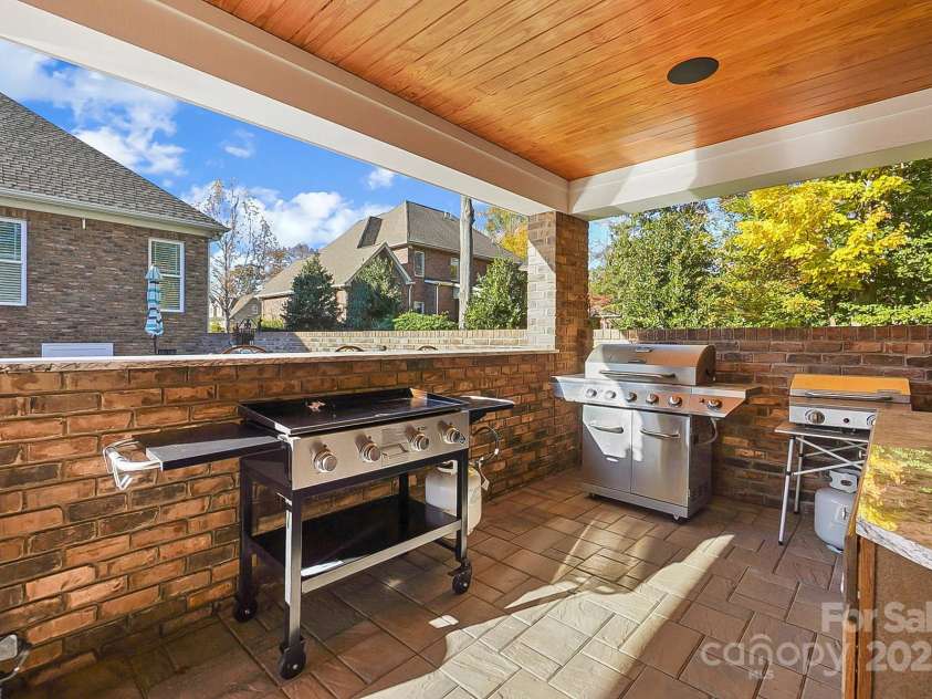 2102 Virginia Ellen Court, Stanley, NC 28164.  MLS# CAR4321172, YatesRealty ID 1121. All Your Outdoor Cooking Including Serving Bar!
