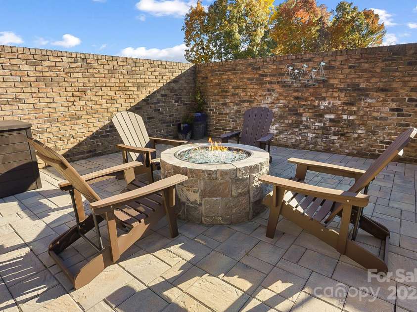 2102 Virginia Ellen Court, Stanley, NC 28164.  MLS# CAR4321172, YatesRealty ID 1121. Carry on the Fun into the Night by this Fire Pit w 32k BTU Burner