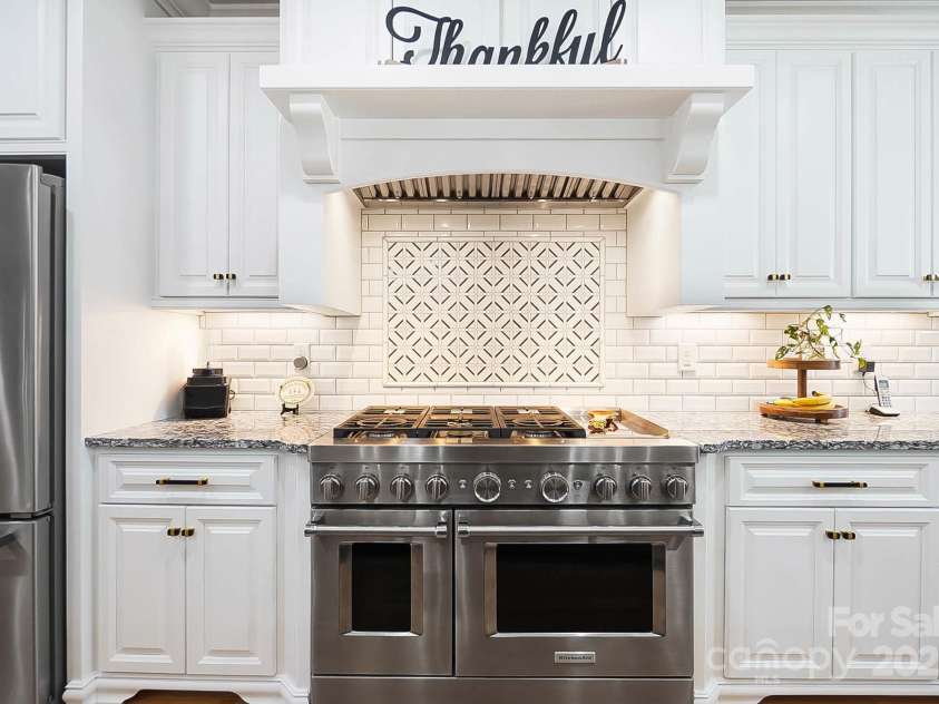 2102 Virginia Ellen Court, Stanley, NC 28164.  MLS# CAR4321172, YatesRealty ID 1121. Kitchen-Aide Natural Gas Burners & 2 Electric Ovens