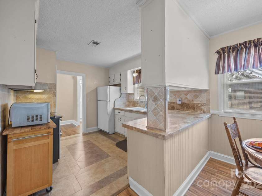 207 Highland Avenue, Concord, NC 28027.  MLS# CAR4314511, YatesRealty ID 11213. 