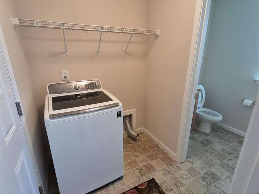 149 Alpine Ridge Drive, Asheville, NC 28803.  MLS# CAR4362702, YatesRealty ID 11214. Half bath & laundry on 1st level