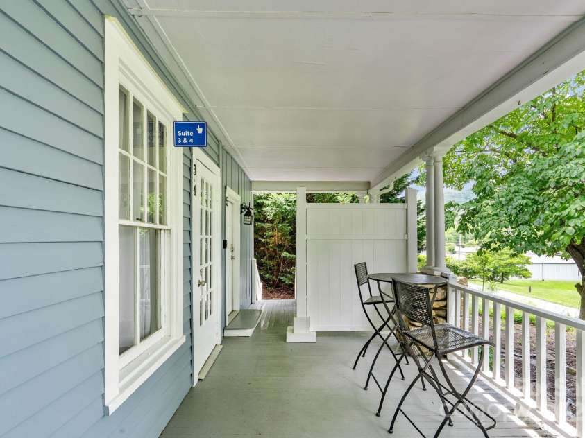 33 Vance Avenue, Black Mountain, NC 28711.  MLS# CAR4220185, YatesRealty ID 1122. #3 & #4 Front Door (stairs to two upstairs units)