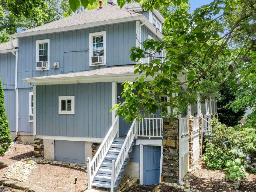 33 Vance Avenue, Black Mountain, NC 28711.  MLS# CAR4220185, YatesRealty ID 1122. Front porch access from parking area. Designated parking spots for each unit.
