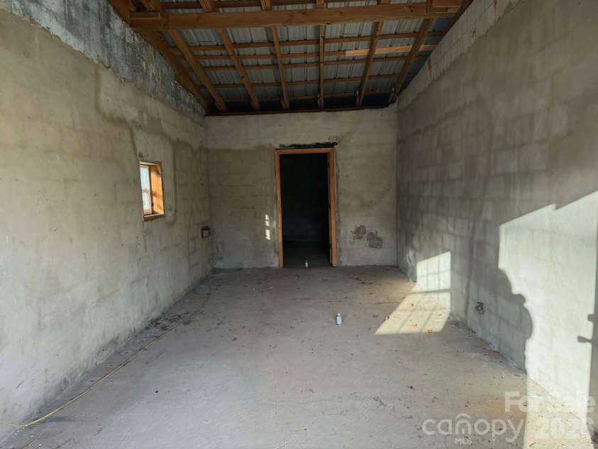 1677 US 221A Highway, Forest City, NC 28043.  MLS# CAR4340129, YatesRealty ID 11221. Left Interior of Shop