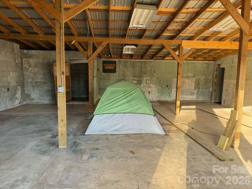 1677 US 221A Highway, Forest City, NC 28043.  MLS# CAR4340129, YatesRealty ID 11221. Shop Main Garage Interior