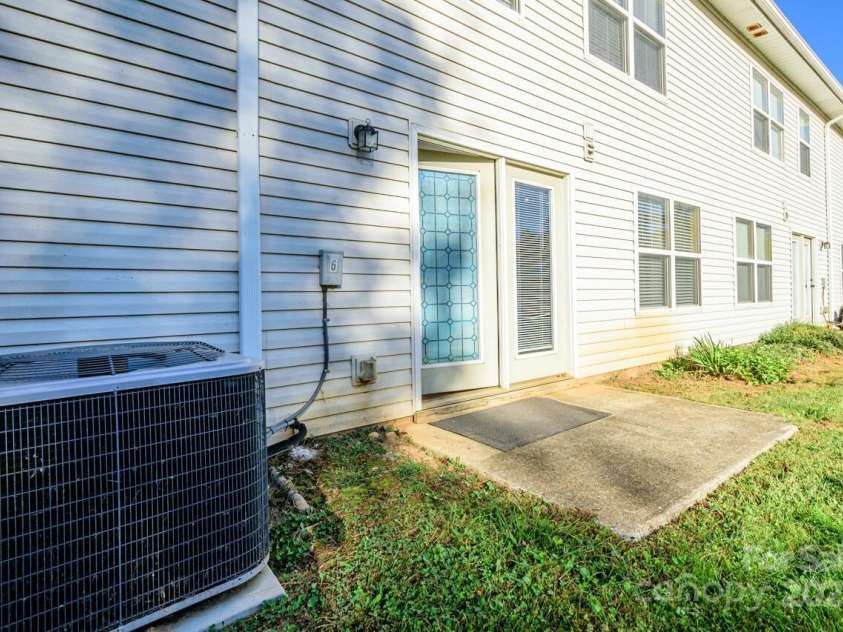 606 Olde Covington Way, Arden, NC 28704.  MLS# CAR4313907, YatesRealty ID 11222. Rear of Unit with Patio