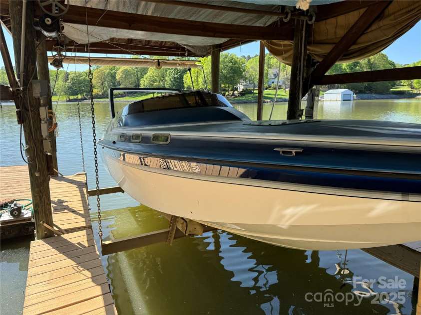 11153 Turtle Bay Court, Tega Cay, SC 29708.  MLS# CAR4238662, YatesRealty ID 11223. Boat Lift