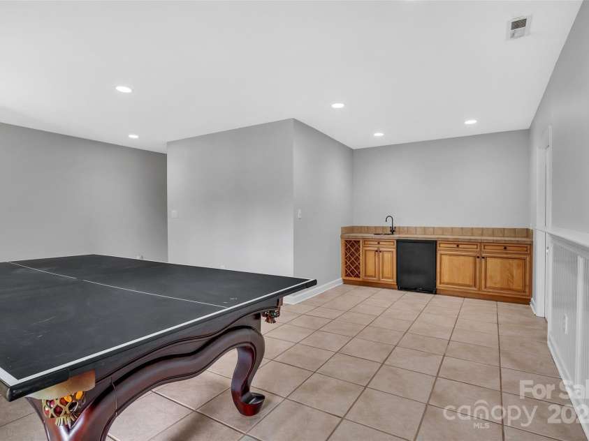 11153 Turtle Bay Court, Tega Cay, SC 29708.  MLS# CAR4238662, YatesRealty ID 11223. Bonus Room Lower Level with wet bar