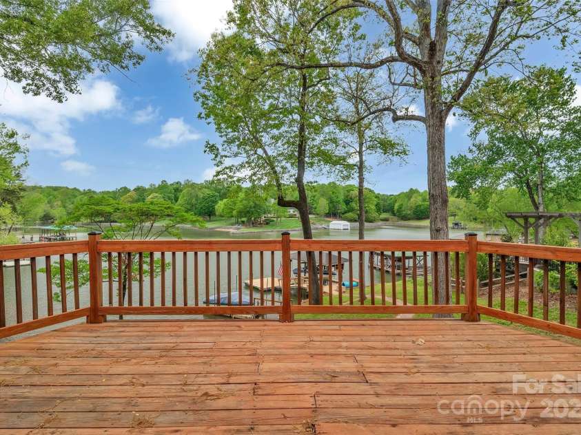 11153 Turtle Bay Court, Tega Cay, SC 29708.  MLS# CAR4238662, YatesRealty ID 11223. Deck views of Lake Wylie