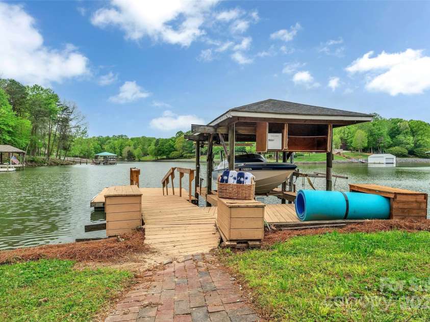 11153 Turtle Bay Court, Tega Cay, SC 29708.  MLS# CAR4238662, YatesRealty ID 11223. Dock with Covered Boat Lift