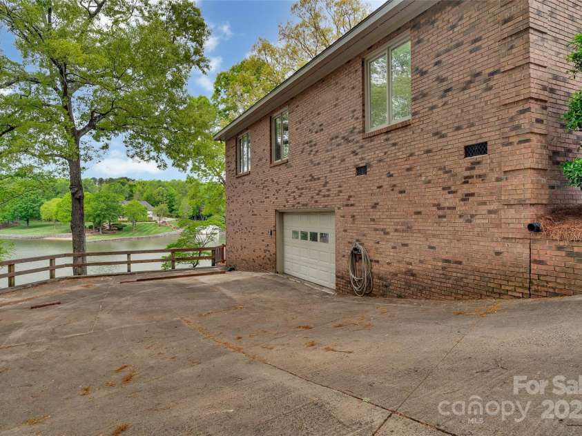 11153 Turtle Bay Court, Tega Cay, SC 29708.  MLS# CAR4238662, YatesRealty ID 11223. Garage 3, side entry