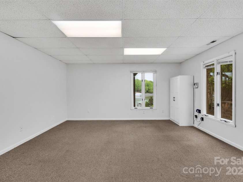 11153 Turtle Bay Court, Tega Cay, SC 29708.  MLS# CAR4238662, YatesRealty ID 11223. Office Lower Level or Guest Room