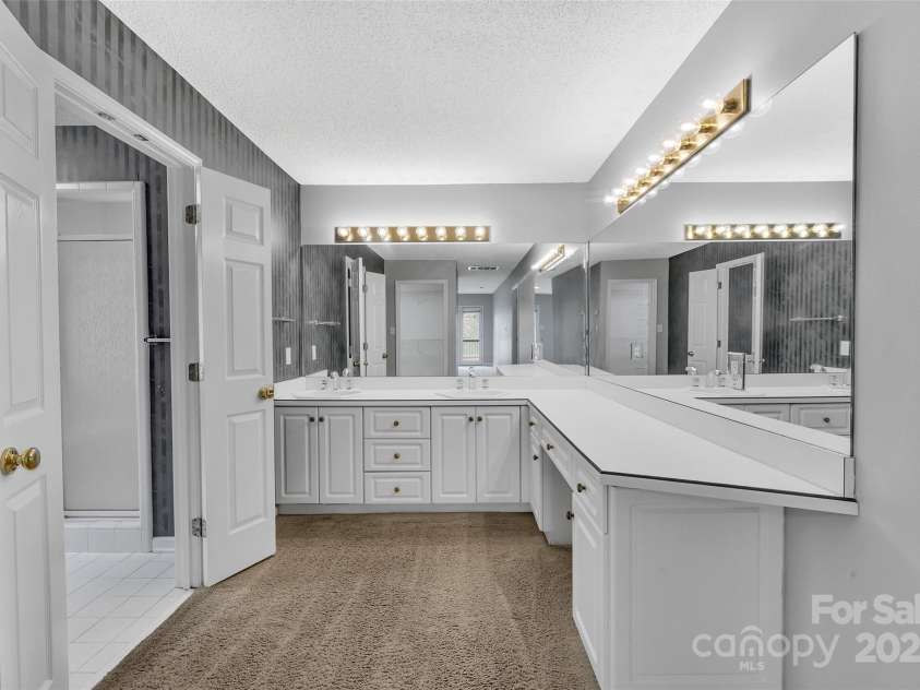 11153 Turtle Bay Court, Tega Cay, SC 29708.  MLS# CAR4238662, YatesRealty ID 11223. Primary Bathroom dressing area