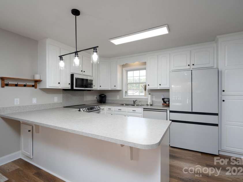 604 Fairway Shores Road, Mount Gilead, NC 27306.  MLS# CAR4231642, YatesRealty ID 11225. 