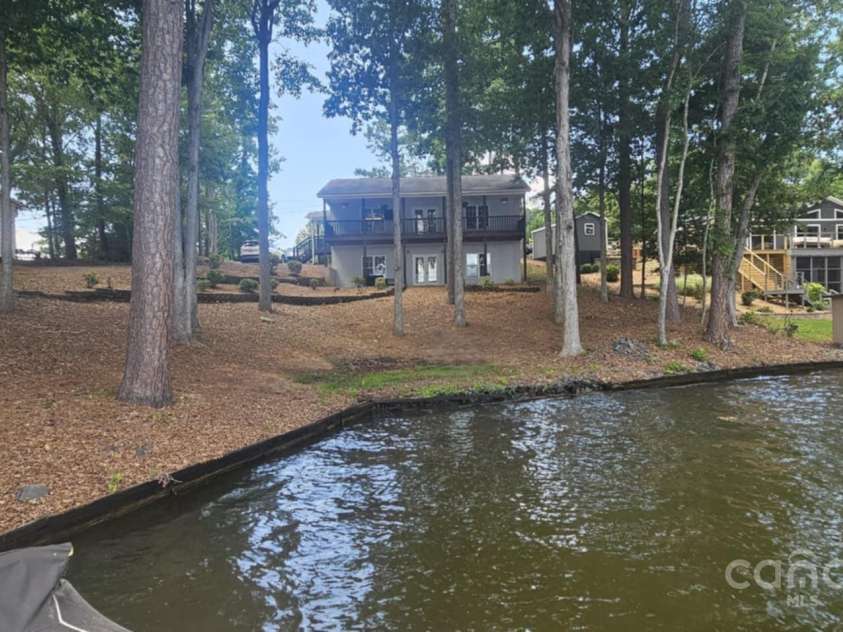 604 Fairway Shores Road, Mount Gilead, NC 27306.  MLS# CAR4231642, YatesRealty ID 11225. 