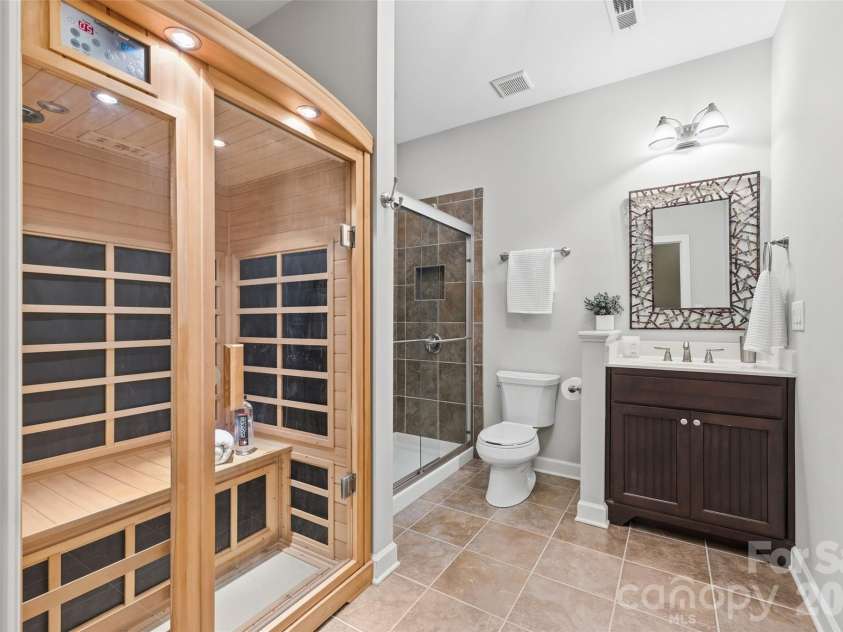 17142 Harcombe Drive, Charlotte, NC 28277.  MLS# CAR4357637, YatesRealty ID 11228. Full bath with a generous sauna to enjoy