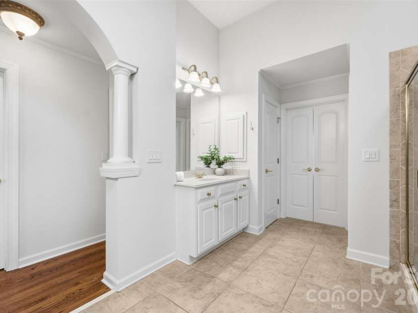 17142 Harcombe Drive, Charlotte, NC 28277.  MLS# CAR4357637, YatesRealty ID 11228. Oversized primary bath with private water closet and access to a flex space that could be used for a home office, nursery or workout room or whatever your heart desires. 