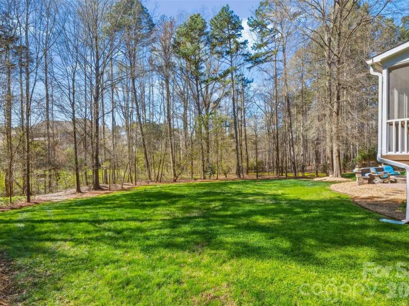 17142 Harcombe Drive, Charlotte, NC 28277.  MLS# CAR4357637, YatesRealty ID 11228. Private, tree lined rear yard
