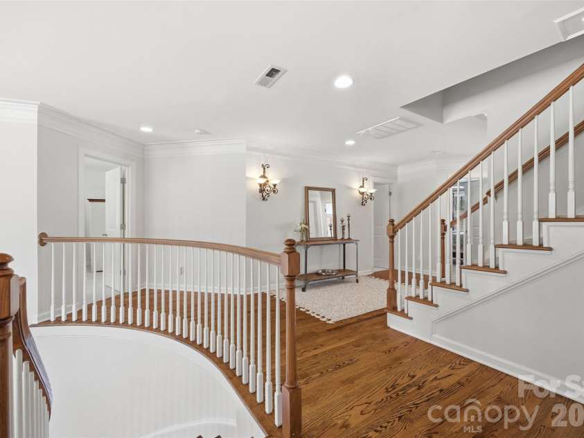 17142 Harcombe Drive, Charlotte, NC 28277.  MLS# CAR4357637, YatesRealty ID 11228. Upper level hall landing