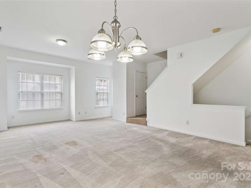 10032 Treeside Lane, Matthews, NC 28105.  MLS# CAR4329245, YatesRealty ID 11229. Living room